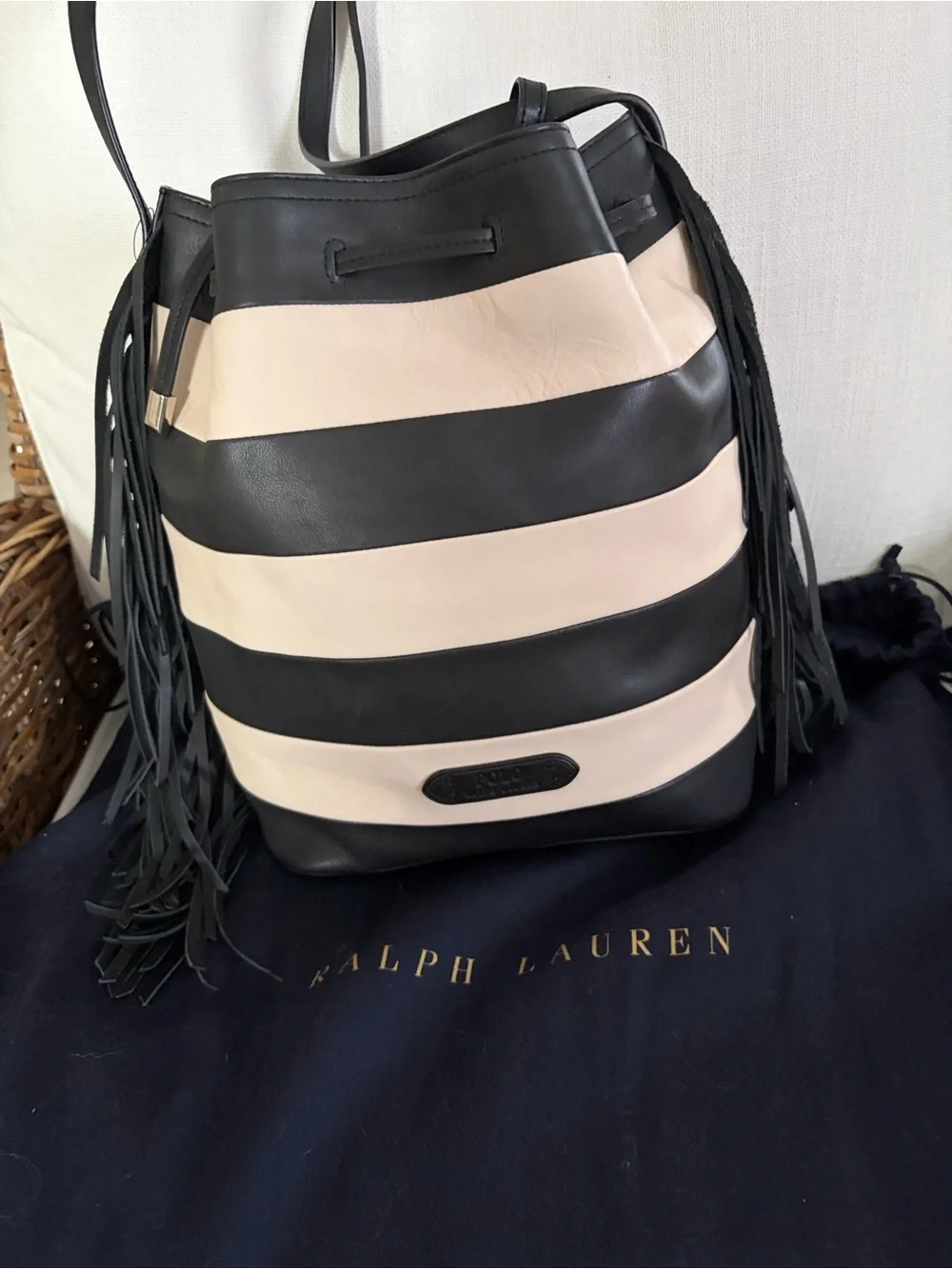 Ralph Lauren Black and cream leather bucket bag with wristlet